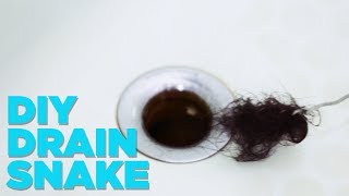 How To Remove Hair From The Drain With A Hanger [upl. by Buschi]