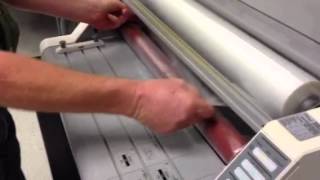 Loading film on GBC Laminator [upl. by Ezeerb538]