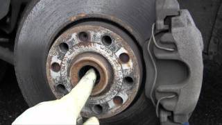 How to remove install axle shaft inspect clicking CV joint VW Passat and Audi A4 A6 DIY driveaxle [upl. by Sagerman]