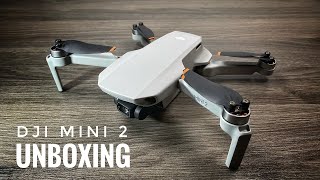 DJI Mini 2 Unboxing  New Ultra Portable 4K Drone [upl. by Namyw]