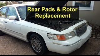 Rear brake pads and rotor replacement Mercury Grand Marquis  VOTD [upl. by Eikciv]