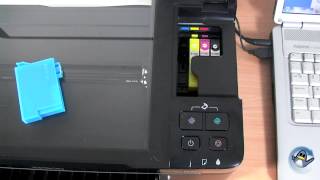 How to Change Ink Cartridges with a Epson Stylus SX125 [upl. by Tina]