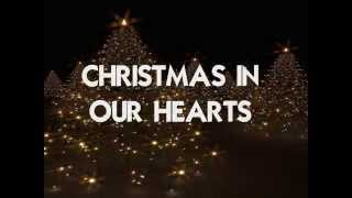 CHRISTMAS IN OUR HEARTS  Lyrics [upl. by Oisinoid]