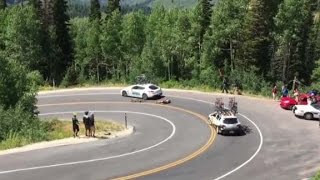 Cyclist racing downhill crashes into moving car [upl. by Vacuva471]