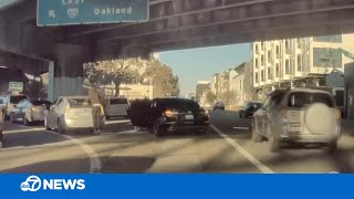 CAUGHT ON CAMERA Driver robbed while in San Francisco traffic near I80 onramp [upl. by Akerley465]