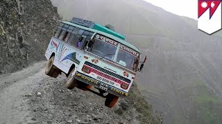 Nepal bus crash Overcrowded bus plunges hundreds of feet down steep hill killing 30  TomoNews [upl. by Sirred]