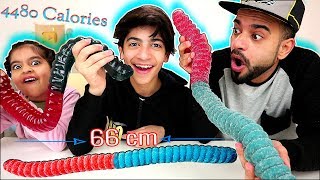 تحدي اكبر واطول جيلاتين بالعالم ضد رضا وزينب والعقاب؟ Worlds Largest  Sour  Gummy Worm Challenge [upl. by Jillie]