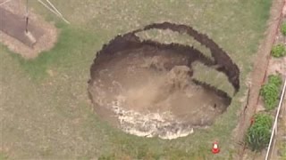 Giant Sinkhole Opens in Backyard [upl. by Arat919]